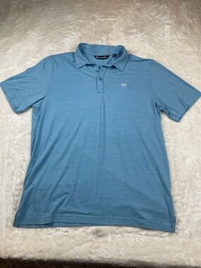 Travis Mathew Men’s Polo in Sky Blue with Subtle Stripe Texture